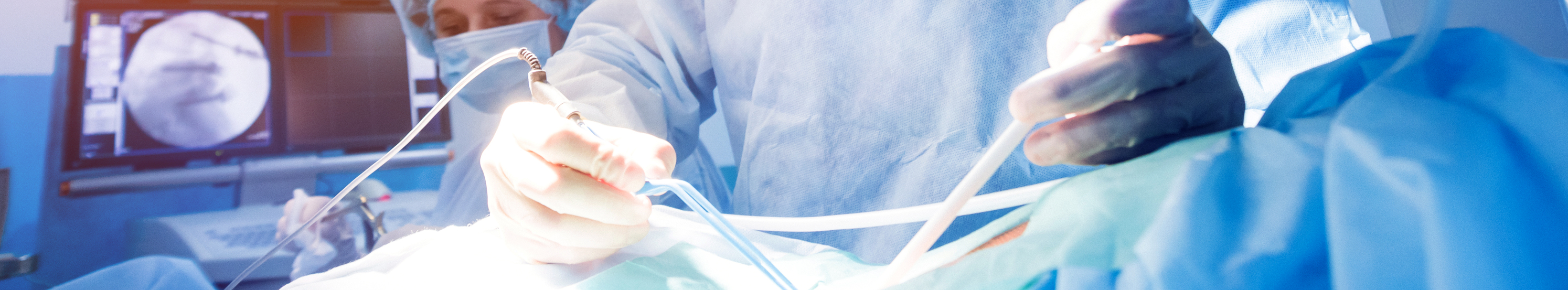 Spinal surgery. Group of surgeons in operating room with surgery equipment. Laminectomy. Modern medical background