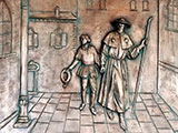 Das Bild zeigt ein Relief an einer Kirchentür in Palermo (Italien).