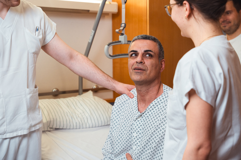 Pflegekräfte mit Patient