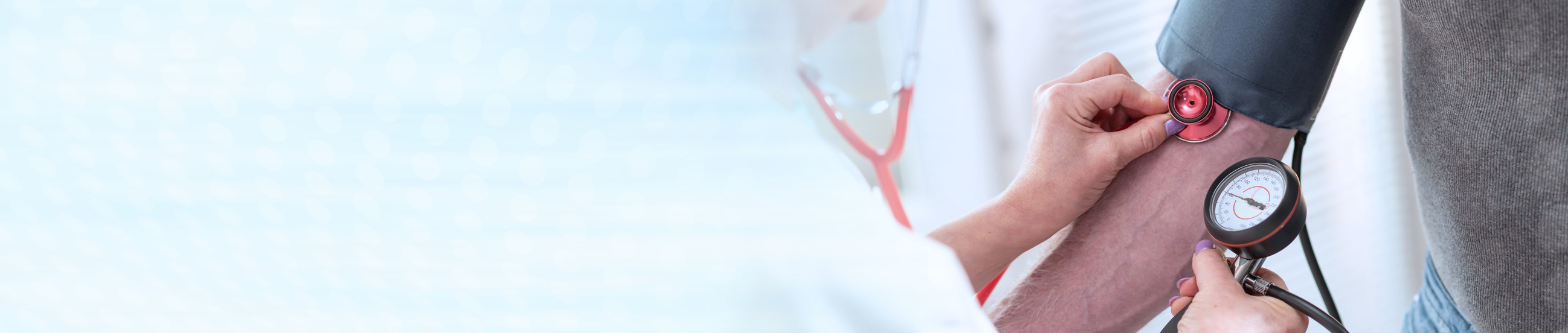 Mesure of blood pressure with sphygmomanometer; panoramic banner
