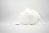 Disposal 3D air pollution or dust mask with adjustable metal noseclip isolated on white back ground and comfort strap.