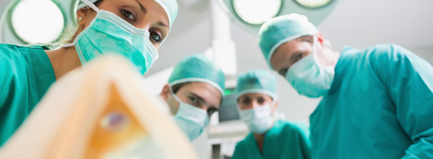 Anesthesia mask holding by a nurse in an operating theatre