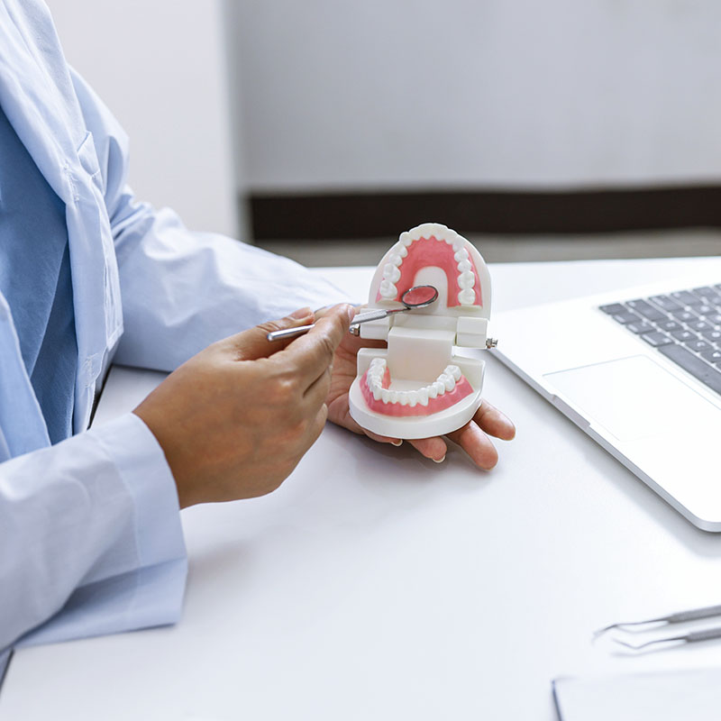 Dentist examining a patient teeth medical treatment at dental clinic